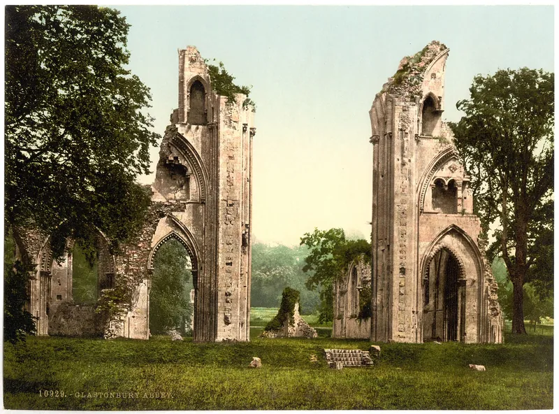 Old colour photograph of the ruined abbey at Glastonbury